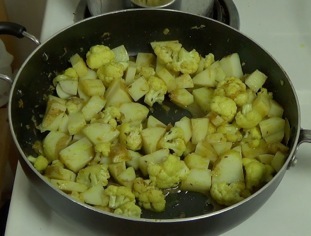 potatoes added to pan