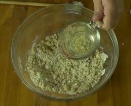 adding coconut oil to the topping mixture