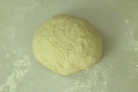 dough on a kneading board after kneading