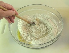mixing flour into the liquid