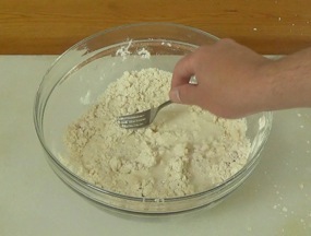 mixing the dough with a fork