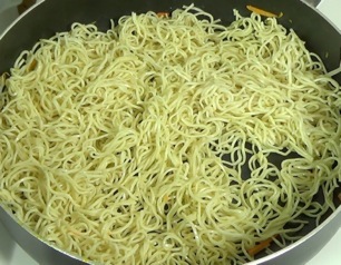 frying the noodles