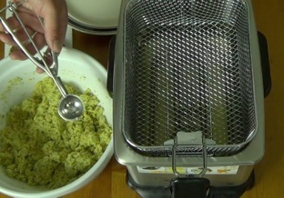 scooping the falafel mixture