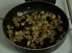 stirfrying the onion, mushrooms and garlic