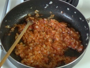 onion mixture with tomato paste, lemon juice and cumin