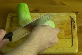 slicing the cucumber flesh lengthwise