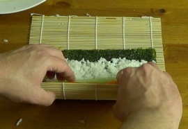 rolling the sushi