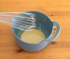 whisking the contents of the bowl