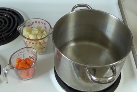 potatoes and carrots, waiting to go into the pot of water
