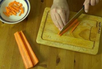 chopping carrots into matchsticks
