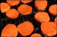 sweet potato slices grilling on the BBQ