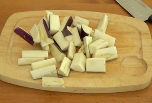 chopping the eggplant crosswise