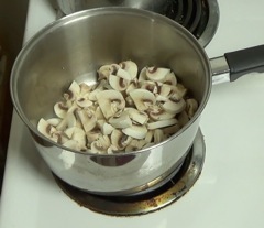 Adding mushrooms to pot